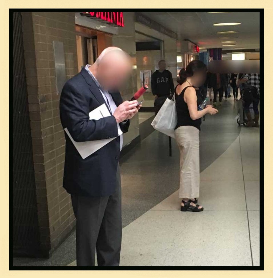 Text Neck Example 1 - Person hunched over phone showing forward head posture